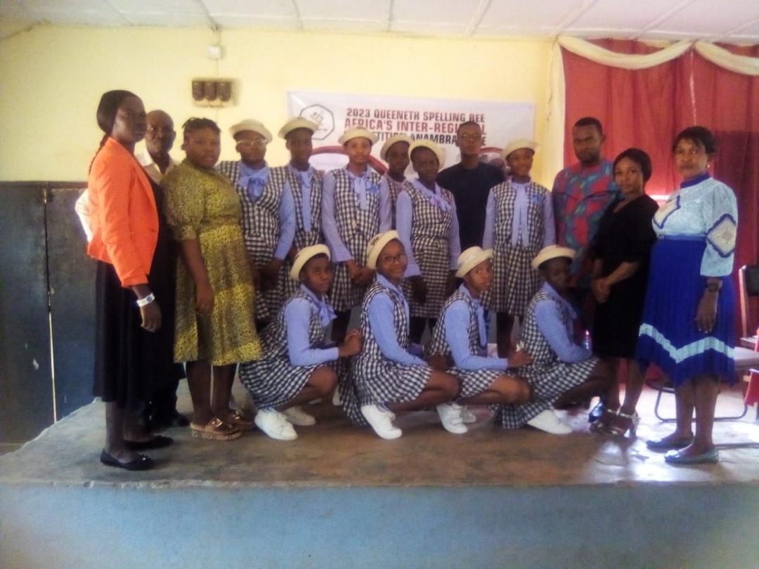 Foundation representatives with a second group of students in competition uniform